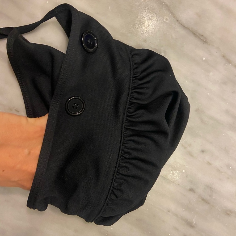 Black bouffant style scrub cap with buttons